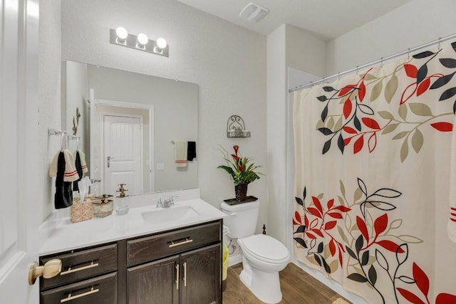 14411 Frankel Loop Unit 32B, Pflugerville, TX 78660 - full bath featuring vanity, wood finished floors, and a shower with shower curtain