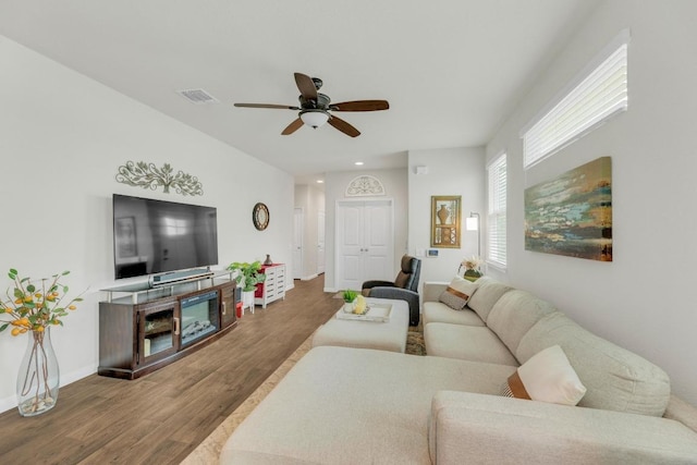 14411 Frankel Loop Unit 32B, Pflugerville, TX 78660 - living room with wood finished floors, a ceiling fan, and recessed lighting