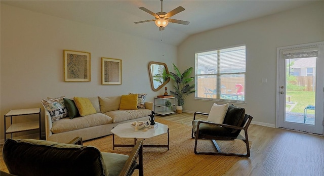520 Elm Green St, Hutto, TX 78634 - living room featuring light wood finished floors, a ceiling fan, and vaulted ceiling