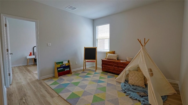 520 Elm Green St, Hutto, TX 78634 - bedroom featuring light wood finished floors and baseboards