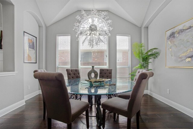 114 Mcbride Ln, Cedar Park, TX 78613 - dining room featuring hardwood / wood-style flooring, plenty of natural light, vaulted ceiling, a chandelier, and arched walkways