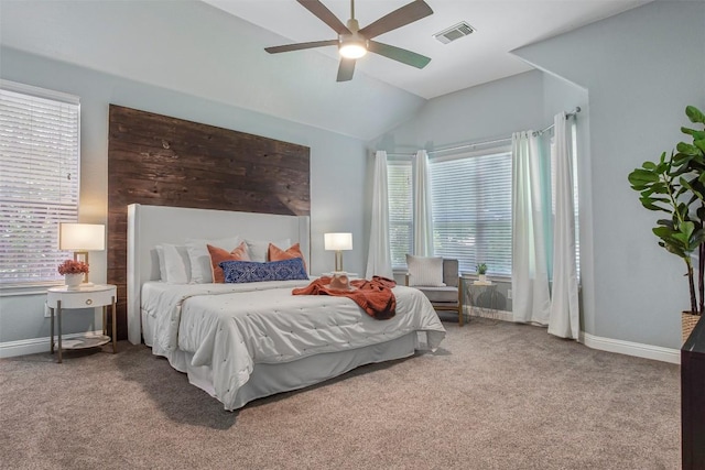 114 Mcbride Ln, Cedar Park, TX 78613 - carpeted bedroom with vaulted ceiling, multiple windows, baseboards, and ceiling fan