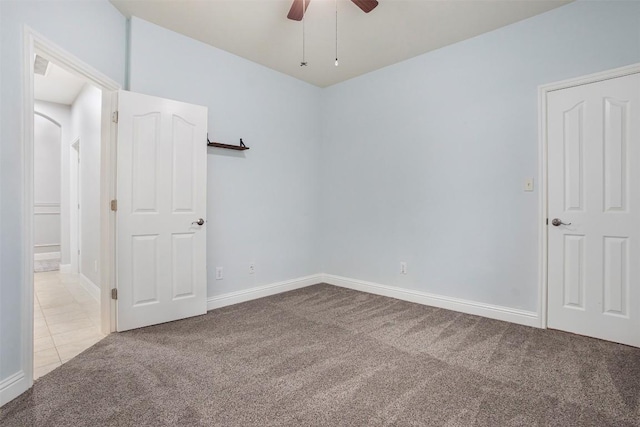114 Mcbride Ln, Cedar Park, TX 78613 - unfurnished bedroom with carpet floors, baseboards, and ceiling fan