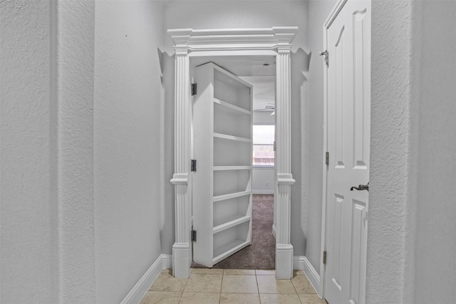 114 Mcbride Ln, Cedar Park, TX 78613 - hall featuring tile patterned flooring, a textured wall, and baseboards