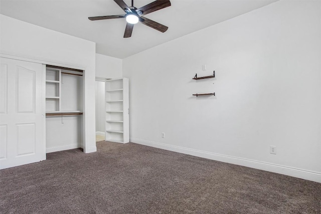 114 Mcbride Ln, Cedar Park, TX 78613 - unfurnished bedroom featuring dark carpet, a closet, baseboards, and a ceiling fan