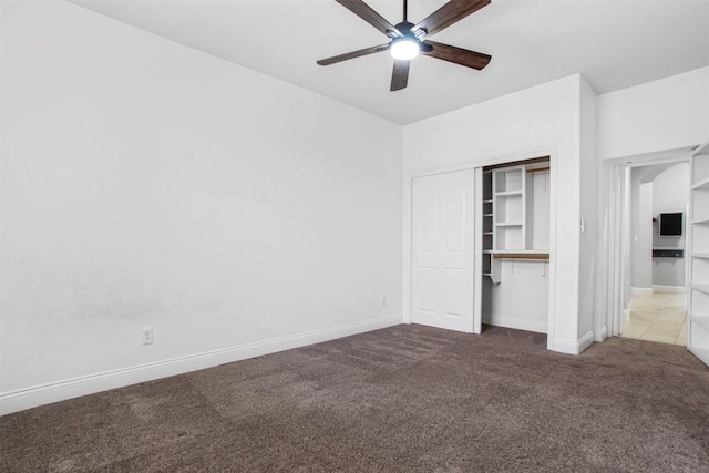 114 Mcbride Ln, Cedar Park, TX 78613 - unfurnished bedroom with carpet floors, a closet, baseboards, and ceiling fan