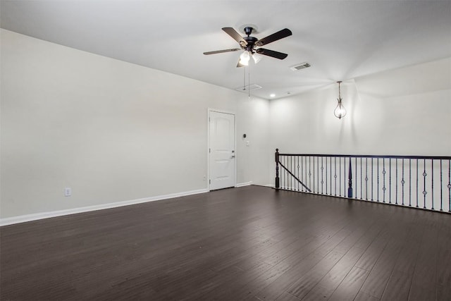 114 Mcbride Ln, Cedar Park, TX 78613 - unfurnished room featuring ceiling fan, baseboards, and dark wood-style floors
