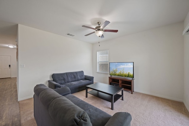 13804 Mark Christopher Way, Manor, TX 78653 - living room with carpet flooring, a ceiling fan, and baseboards