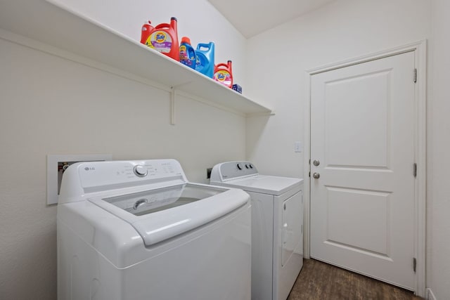 13804 Mark Christopher Way, Manor, TX 78653 - laundry area featuring washing machine and clothes dryer and dark wood-type flooring