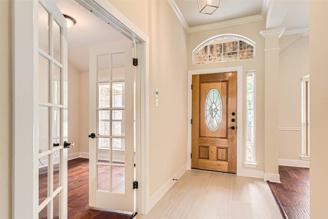 6411 Abilene Trl, Austin, TX 78749 - entrance foyer with french doors, wood finished floors, and ornamental molding