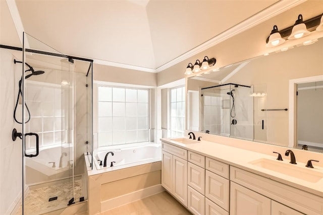 6411 Abilene Trl, Austin, TX 78749 - full bath featuring a garden tub, a shower stall, double vanity, and vaulted ceiling