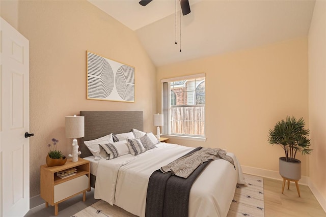 6411 Abilene Trl, Austin, TX 78749 - bedroom with lofted ceiling, light wood-style flooring, and a ceiling fan