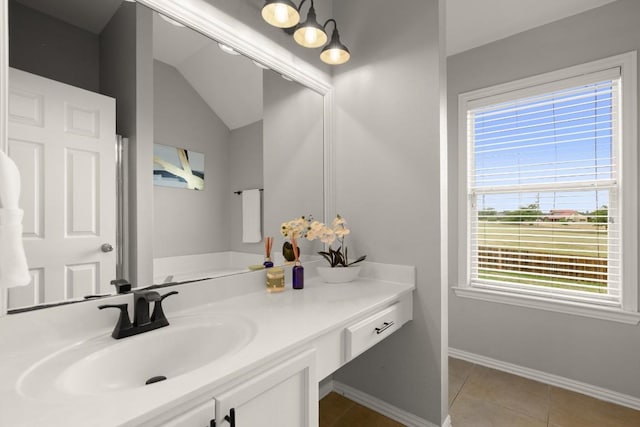3505 Winding Shore Ln, Pflugerville, TX 78660 - bathroom featuring vanity, baseboards, and tile patterned floors