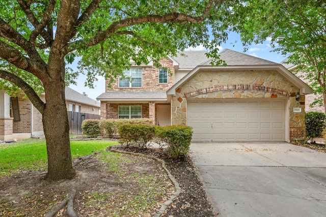 3505 Winding Shore Ln, Pflugerville, TX 78660 - view of front of home featuring stone siding, concrete driveway, brick siding, a garage, and a shingled roof