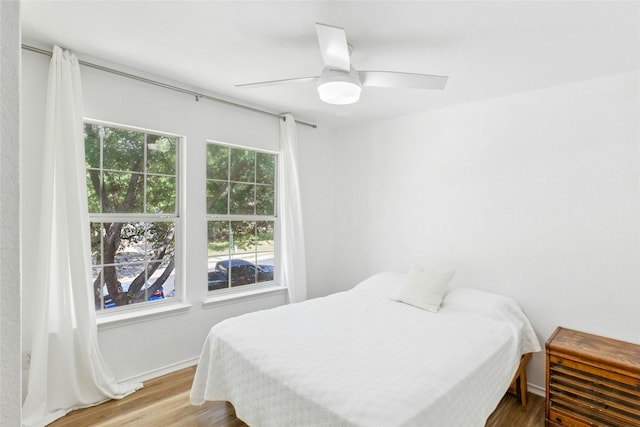 11208 Midbury Ct, Austin, TX 78748 - bedroom featuring wood finished floors and ceiling fan