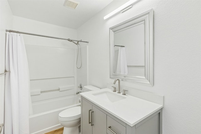 11208 Midbury Ct, Austin, TX 78748 - bathroom featuring toilet, vanity, and shower / tub combo
