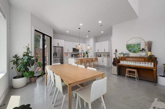 2935 Moss St Unit 1, Austin, TX 78722 - dining area featuring recessed lighting and concrete flooring