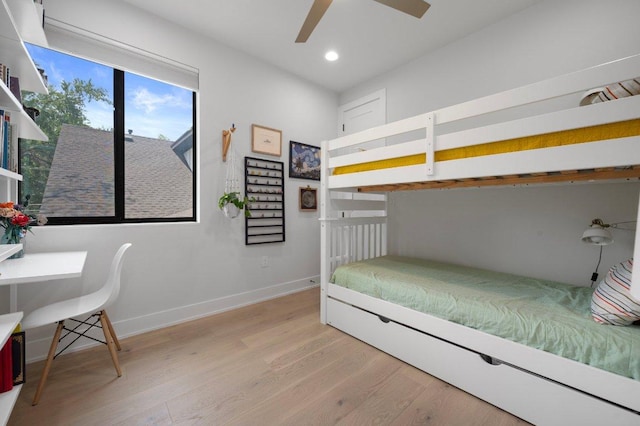 2935 Moss St Unit 1, Austin, TX 78722 - bedroom featuring wood finished floors, recessed lighting, baseboards, and ceiling fan