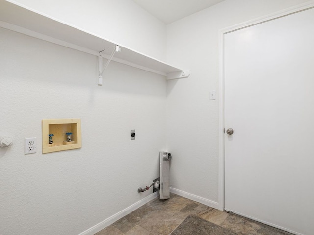 2424 Emmett Pkwy, Austin, TX 78728 - washroom featuring hookup for a gas dryer, electric dryer hookup, hookup for a washing machine, and baseboards