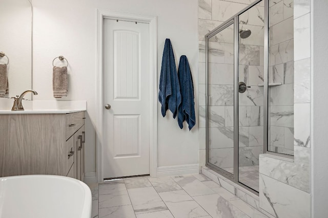 17720 Cain Clearing Pass, Austin, TX 78738 - full bathroom with marble finish flooring, a soaking tub, a shower stall, and vanity
