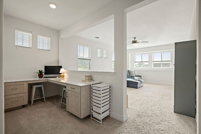 17720 Cain Clearing Pass, Austin, TX 78738 - home office with light carpet, plenty of natural light, ceiling fan, built in study area, and recessed lighting