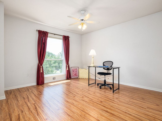 2009 Saint Andrews Dr, Round Rock, TX 78664 - home office featuring light wood-type flooring and ceiling fan