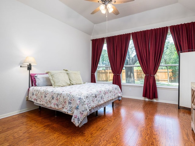 2009 Saint Andrews Dr, Round Rock, TX 78664 - bedroom featuring wood finished floors, ceiling fan, and vaulted ceiling