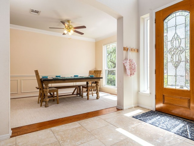 2009 Saint Andrews Dr, Round Rock, TX 78664 - tiled foyer with crown molding and a ceiling fan