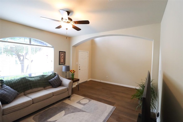 3707 Tall Cedars Rd, Cedar Park, TX 78613 - living area with arched walkways, wood finished floors, and ceiling fan
