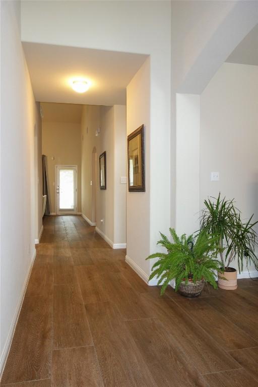 3707 Tall Cedars Rd, Cedar Park, TX 78613 - hallway featuring wood finished floors and baseboards