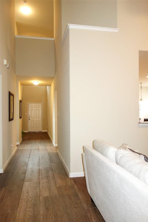 3707 Tall Cedars Rd, Cedar Park, TX 78613 - hall with baseboards and wood finished floors