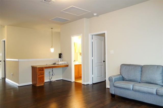 3707 Tall Cedars Rd, Cedar Park, TX 78613 - living room featuring dark wood-style flooring and attic access