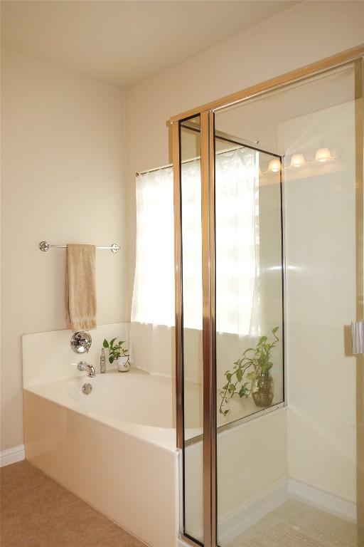 3707 Tall Cedars Rd, Cedar Park, TX 78613 - bathroom featuring a garden tub and a stall shower