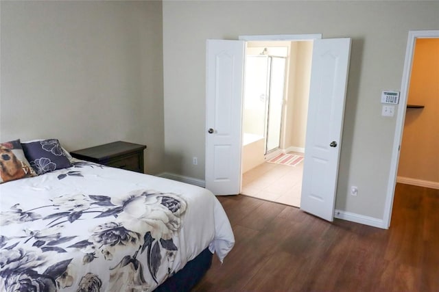 3707 Tall Cedars Rd, Cedar Park, TX 78613 - bedroom with dark wood-type flooring and baseboards