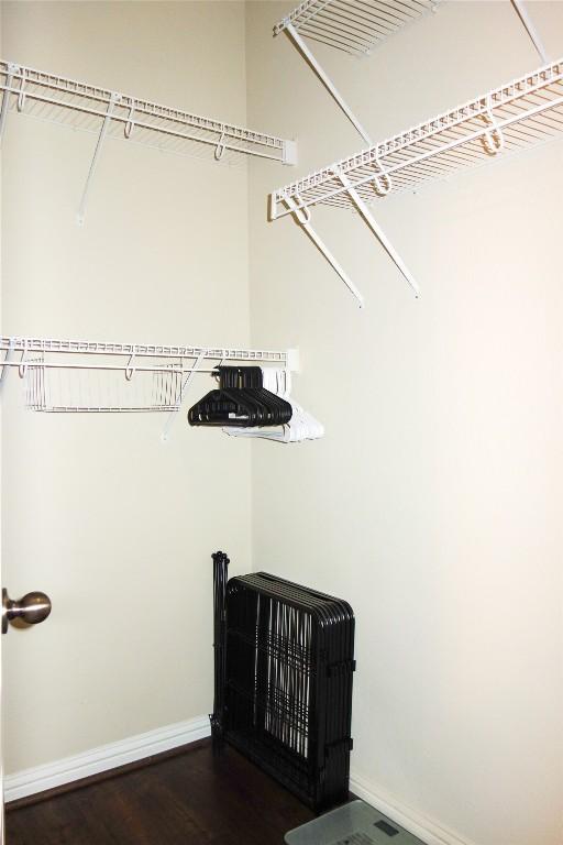 3707 Tall Cedars Rd, Cedar Park, TX 78613 - walk in closet featuring dark wood-type flooring