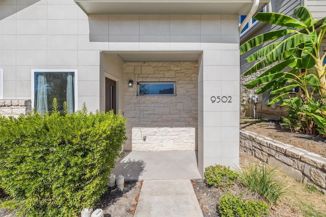 9502 Whisper Willow Blvd, Manor, TX 78653 - property entrance with stone siding