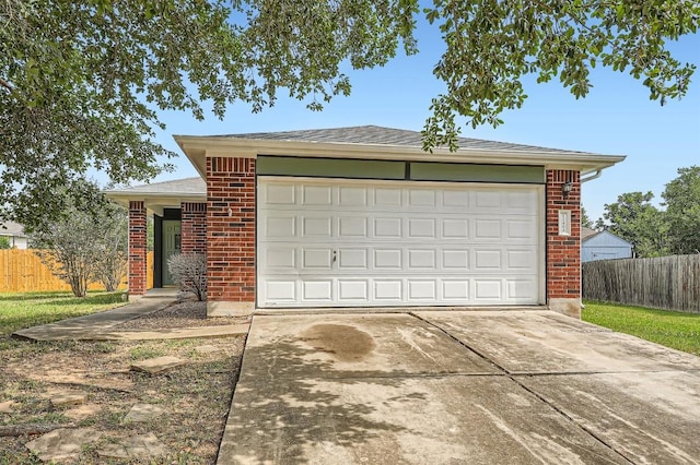 12404 Campana Dr, Del Valle, TX 78617 - garage featuring concrete driveway
