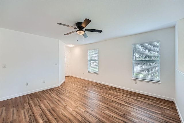 12404 Campana Dr, Del Valle, TX 78617 - unfurnished room with wood finished floors and a ceiling fan