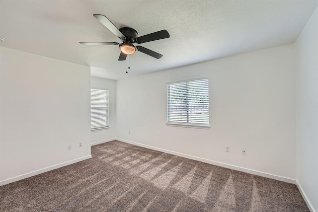12404 Campana Dr, Del Valle, TX 78617 - unfurnished room featuring healthy amount of natural light, carpet, and a ceiling fan