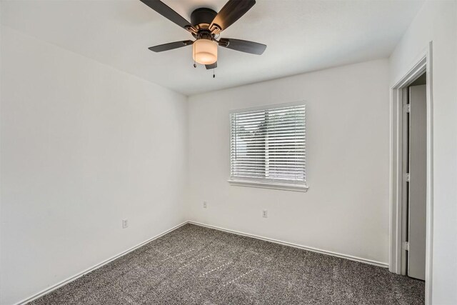 12404 Campana Dr, Del Valle, TX 78617 - unfurnished bedroom featuring carpet flooring and a ceiling fan