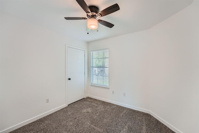 12404 Campana Dr, Del Valle, TX 78617 - unfurnished room featuring dark colored carpet and a ceiling fan