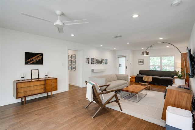 5205 Gladstone Dr, Austin, TX 78723 - living room with light wood-style flooring, recessed lighting, and ceiling fan