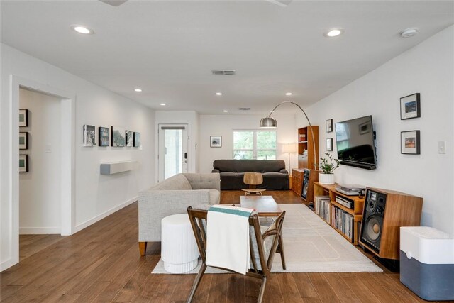 5205 Gladstone Dr, Austin, TX 78723 - living room with wood finished floors, recessed lighting, and baseboards