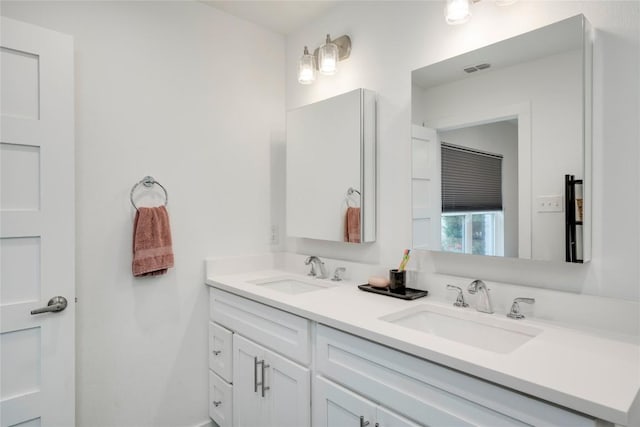 5205 Gladstone Dr, Austin, TX 78723 - full bathroom featuring double vanity
