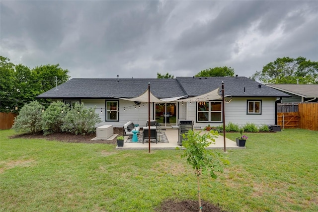 5205 Gladstone Dr, Austin, TX 78723 - rear view of property featuring a patio area and a shingled roof