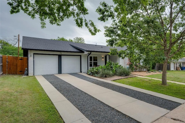 5205 Gladstone Dr, Austin, TX 78723 - single story home with an attached garage, concrete driveway, brick siding, and roof with shingles