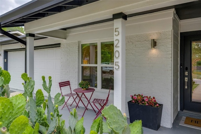 5205 Gladstone Dr, Austin, TX 78723 - entrance to property featuring brick siding and an attached garage