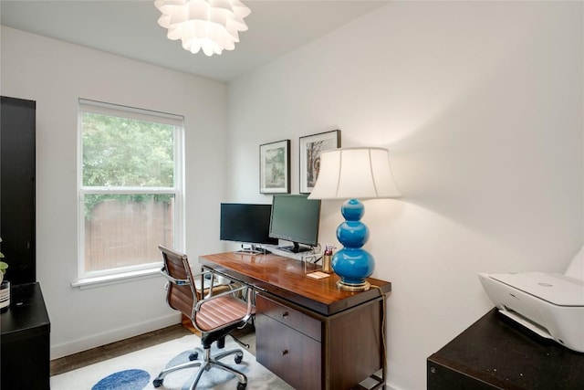 5205 Gladstone Dr, Austin, TX 78723 - office space featuring a chandelier and baseboards