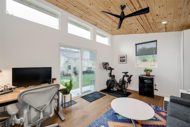 5205 Gladstone Dr, Austin, TX 78723 - office space featuring wooden ceiling, a ceiling fan, wood finished floors, baseboards, and a high ceiling