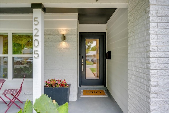 5205 Gladstone Dr, Austin, TX 78723 - doorway to property with brick siding